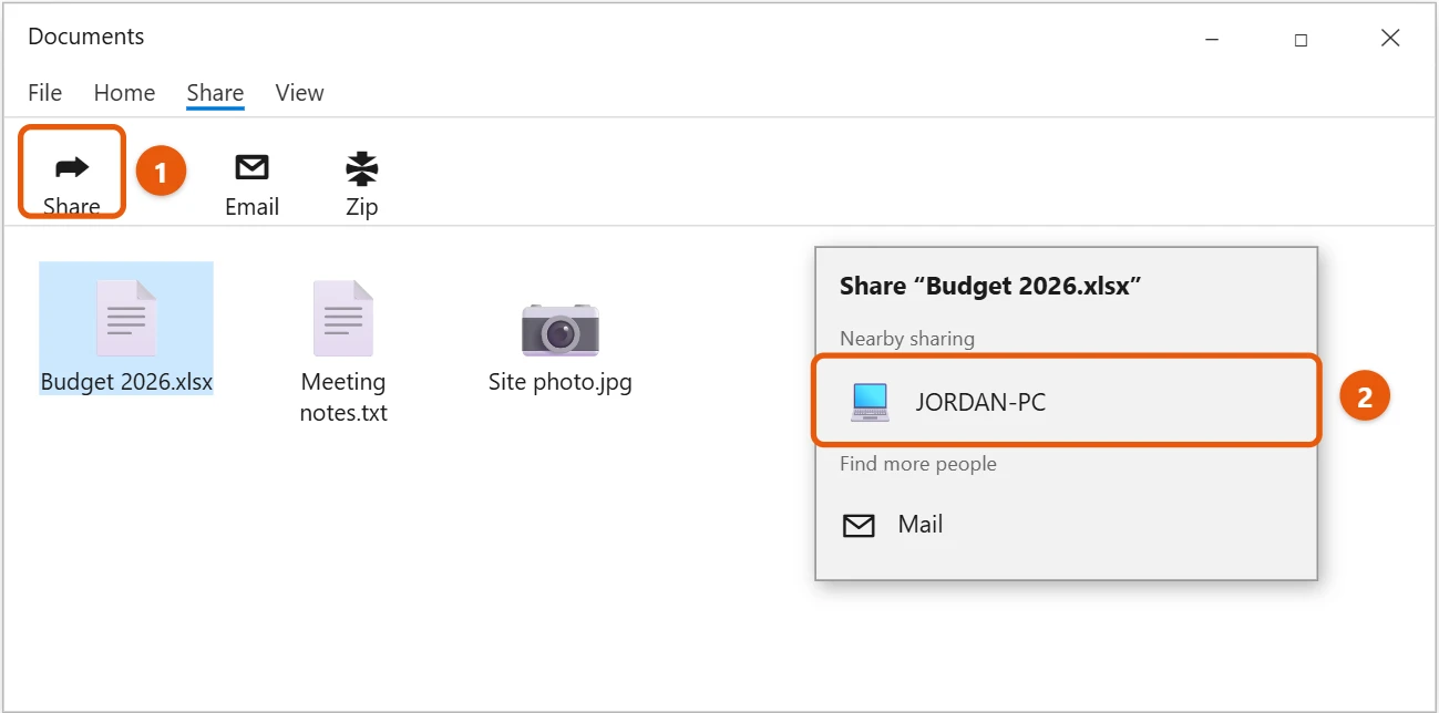 How to Transfer Files from PC to PC in Windows 10 2 Windows 10 File Explorer Share tab with the Share button and a nearby PC highlighted