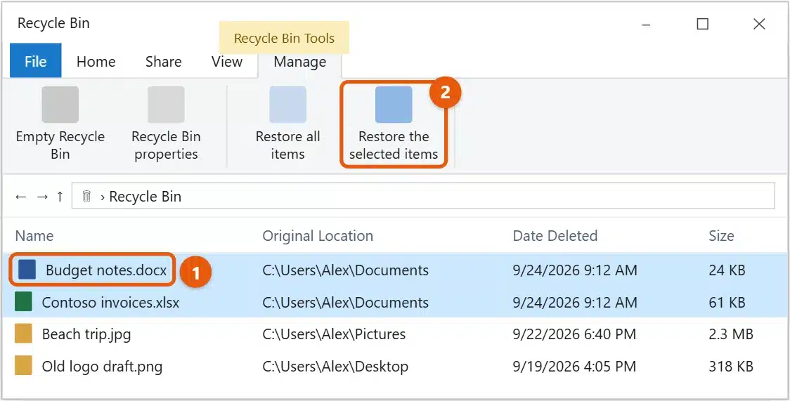 How to Access the Recycle Bin in Windows 10 2 Windows 10 Recycle Bin window with two deleted files selected and Restore the selected items highlighted on the Manage tab