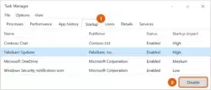 Windows 10 Task Manager Startup tab with Fabrikam Updater selected and the Disable button highlighted