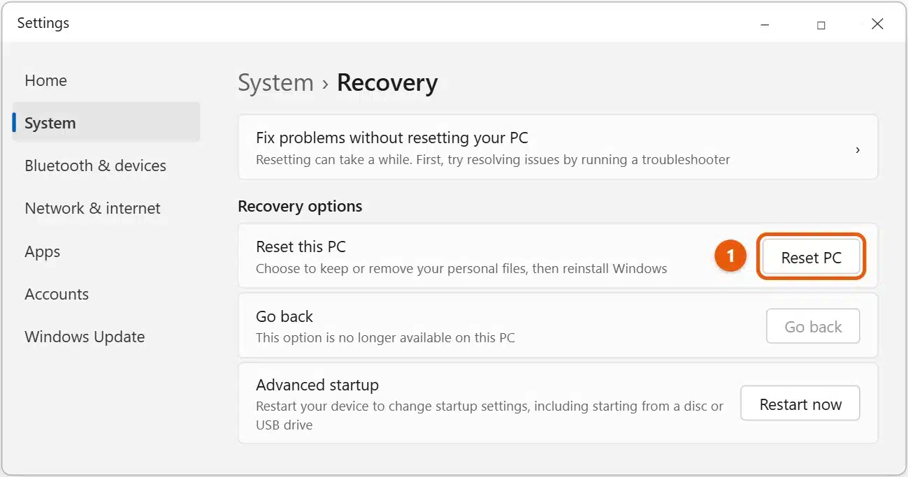 How to Reset Windows 11 1 Windows 11 Settings, System, Recovery page with the Reset PC button highlighted next to Reset this PC