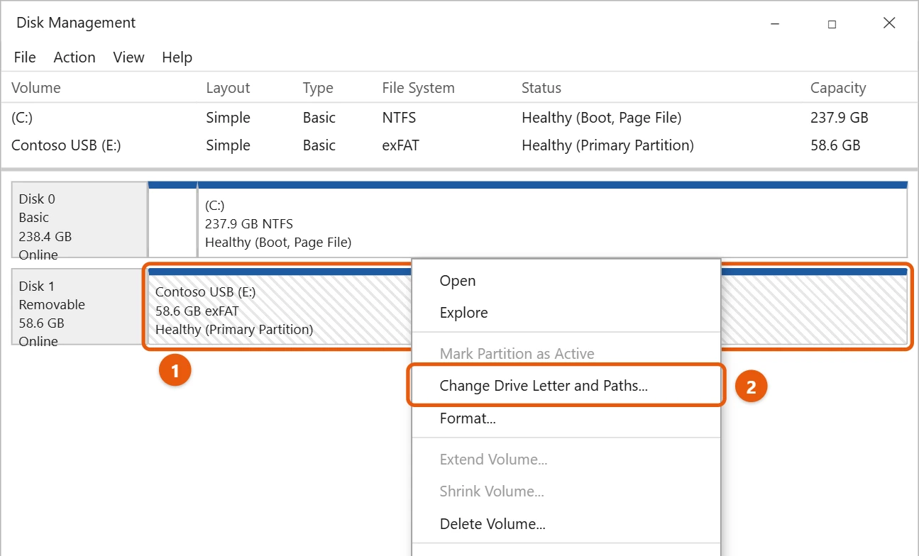 How to Change a Drive Letter in Windows 10 1 Windows 10 Disk Management with a right-click menu open on a Contoso USB drive and Change Drive Letter and Paths highlighted