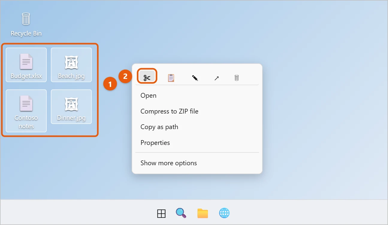 How to Clear Your Desktop Without Deleting Files in Windows 11 1 Several files selected on the Windows 11 desktop with the Cut icon highlighted in the right-click menu