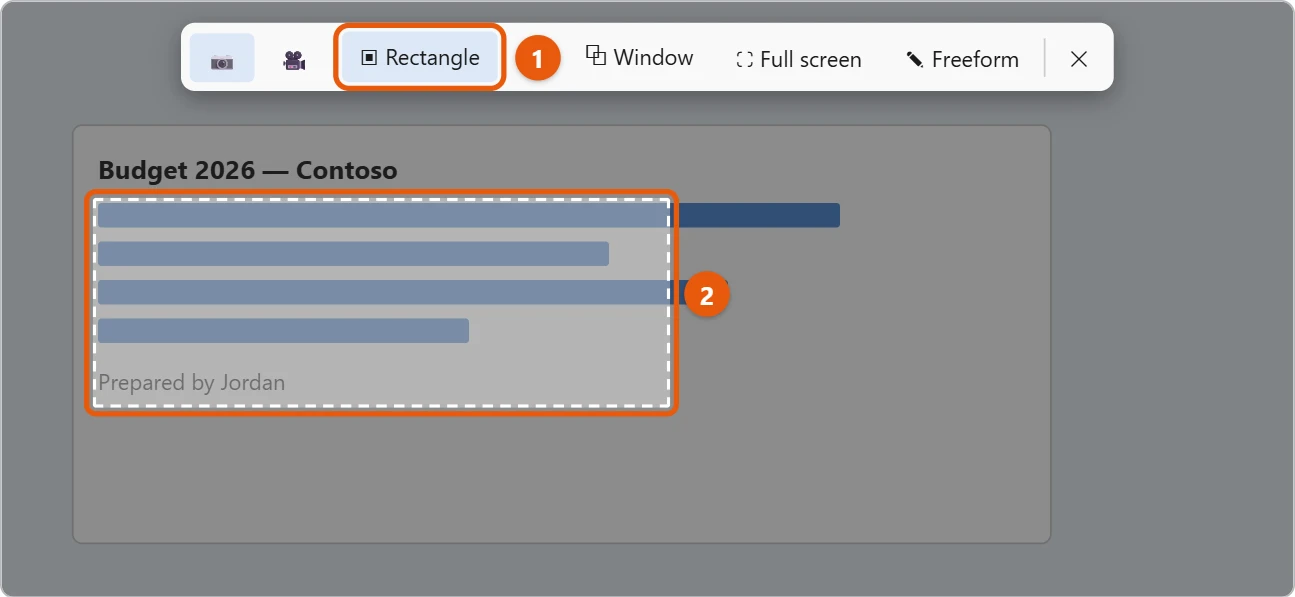 How to Take a Screenshot in Windows 11 1 Windows 11 Snipping Tool toolbar over a dimmed screen with Rectangle mode selected and an area being dragged