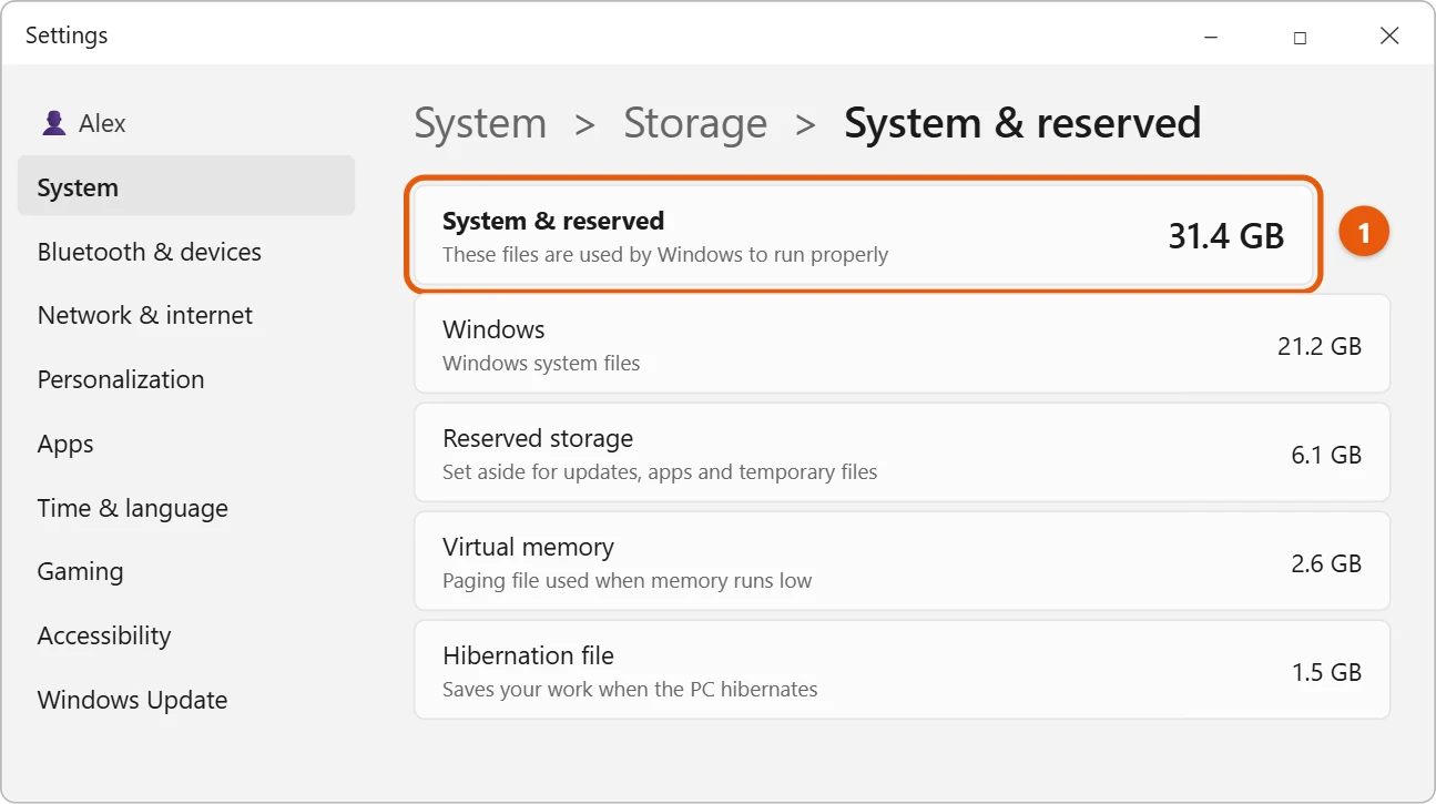 How Much Space Does Windows 11 Take Up? 1 Illustration of Windows 11 Settings Storage System and reserved page showing Windows, Reserved storage, Virtual memory and Hibernation file sizes