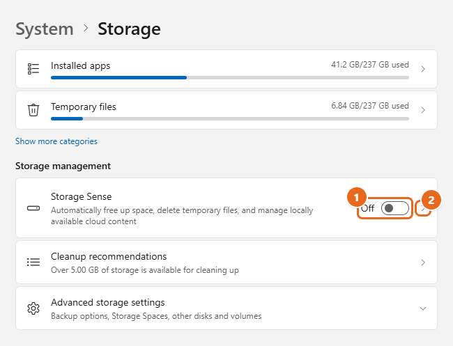 How to Use Storage Sense in Windows 11 1 Windows 11 Settings Storage page with the Storage Sense switch and the arrow that opens Storage Sense settings highlighted
